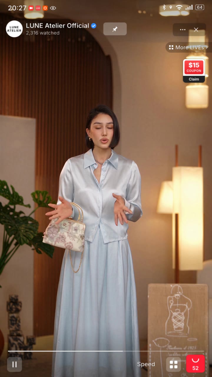 AI digital human presenting fashion products during a live shopping stream