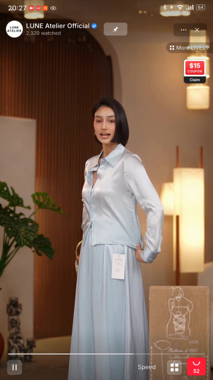 AI livestreaming setup showing a digital human presenting products during a live shopping session